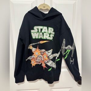 Black Star Wars hooded sweat shirt with space ship battle scene.